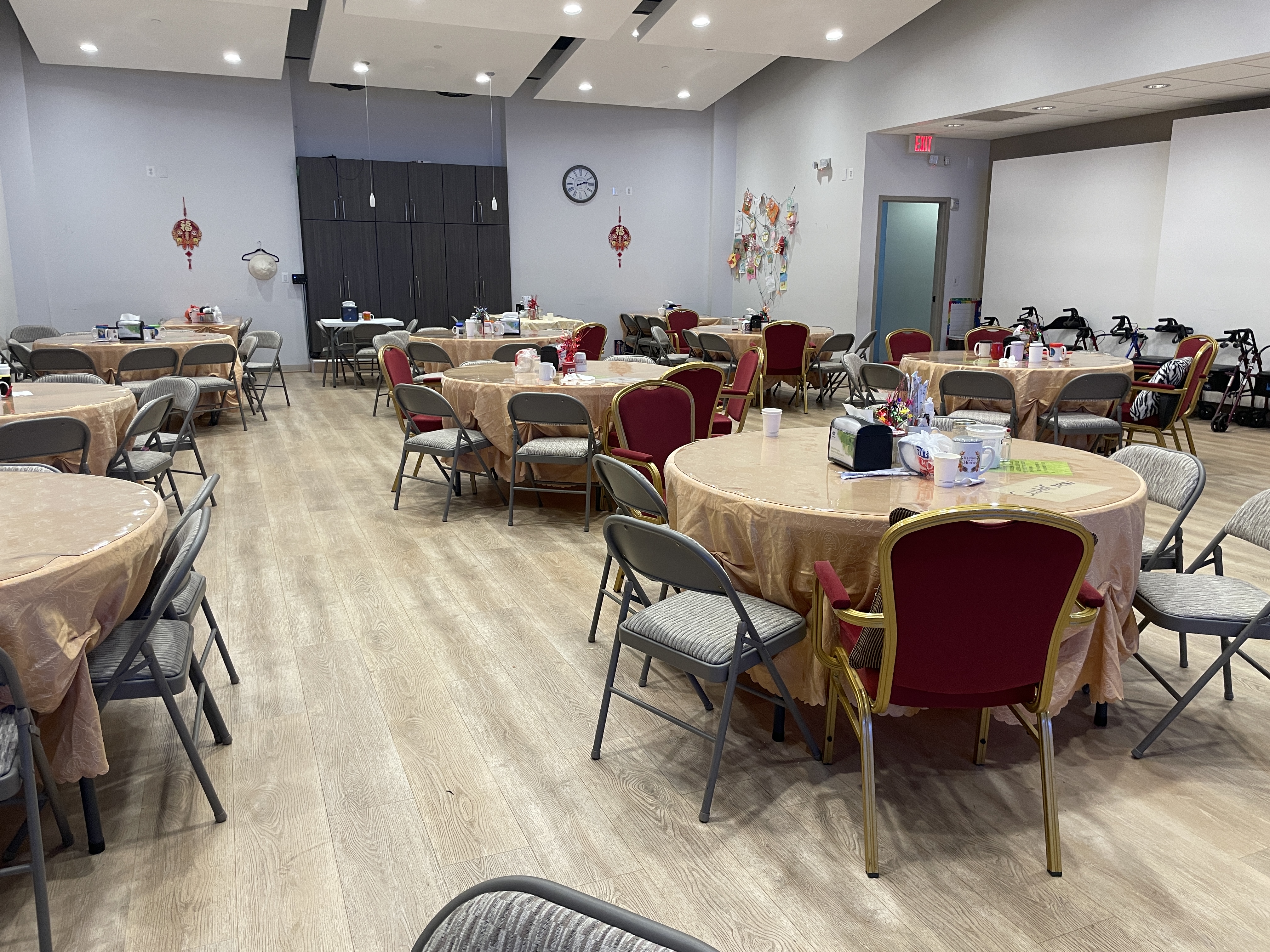 The dining and activity hall at Le Yuan, with round tables that seat 6 to 8